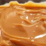How to Make Slow Cooker Condensed Milk Caramel (Dulce de Leche) 5 Two unopened cans of condensed milk in a slow cooker filled with water