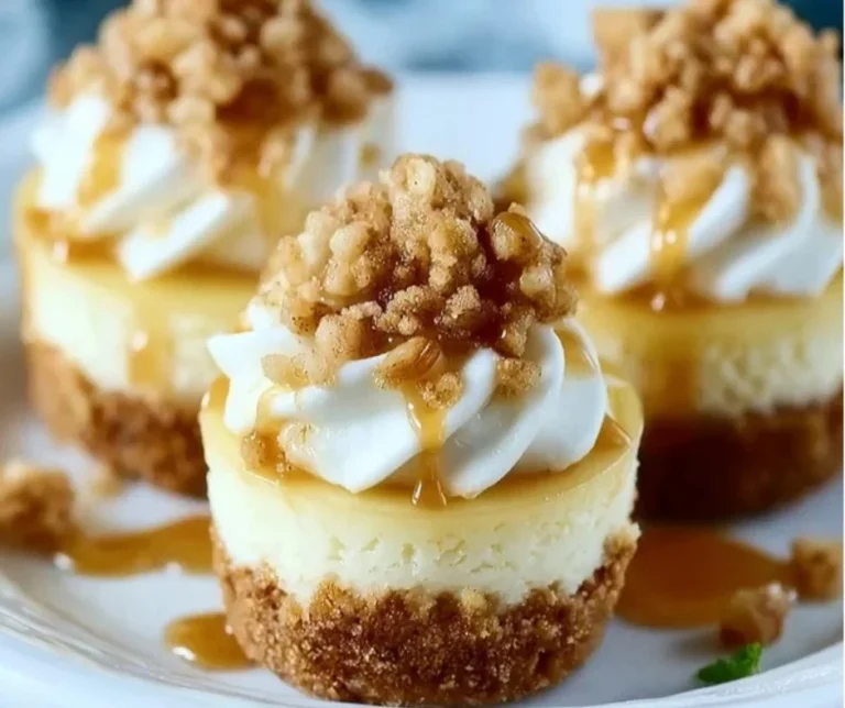 Easy apple crisp mini cheesecakes topped with crunchy streusel and warm apple topping.
