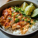 Delicious Coconut Chicken Rice Bowl with vibrant vegetables and rich coconut sauce.