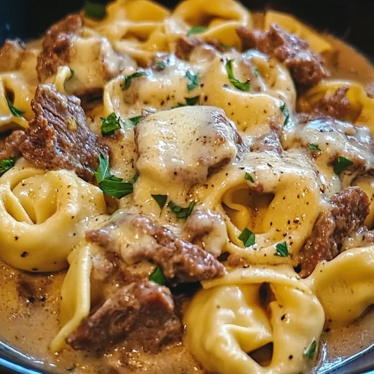 Philly Cheesesteak Tortellini Pasta 2 Philly Cheesesteak Tortellini Pasta dish with cheese and toppings